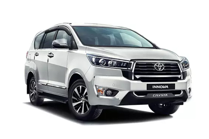 White Toyota Innova Crysta
